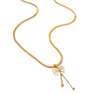 Bow statement, necklace, gold plated