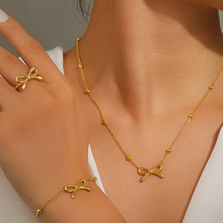 necklace, bow bracelet